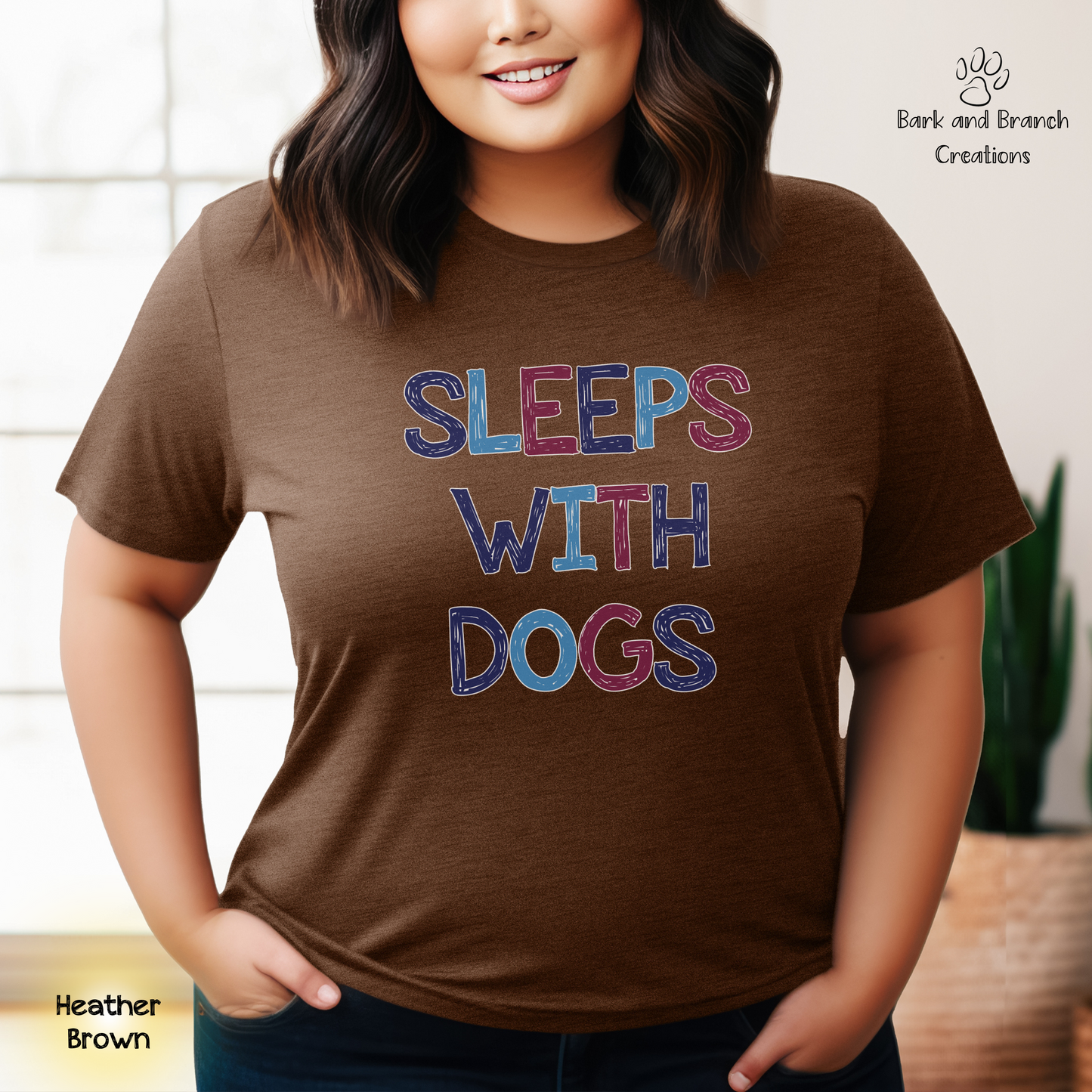 Sleeps With Dogs Soft T-Shirt | Funny Dog Mom Tee | Dog Dad Shirt | Dog Lover Gift | Support Rescue Efforts