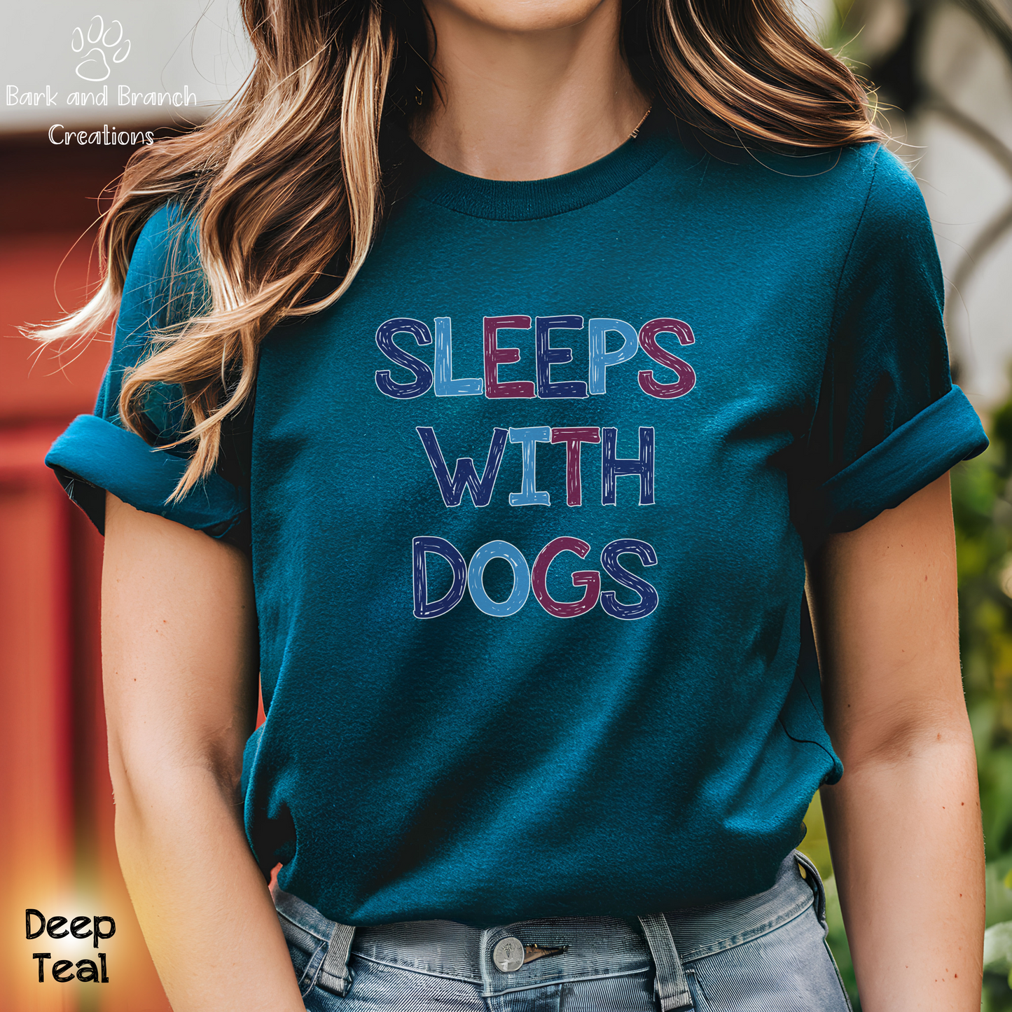 Sleeps With Dogs Soft T-Shirt | Funny Dog Mom Tee | Dog Dad Shirt | Dog Lover Gift | Support Rescue Efforts