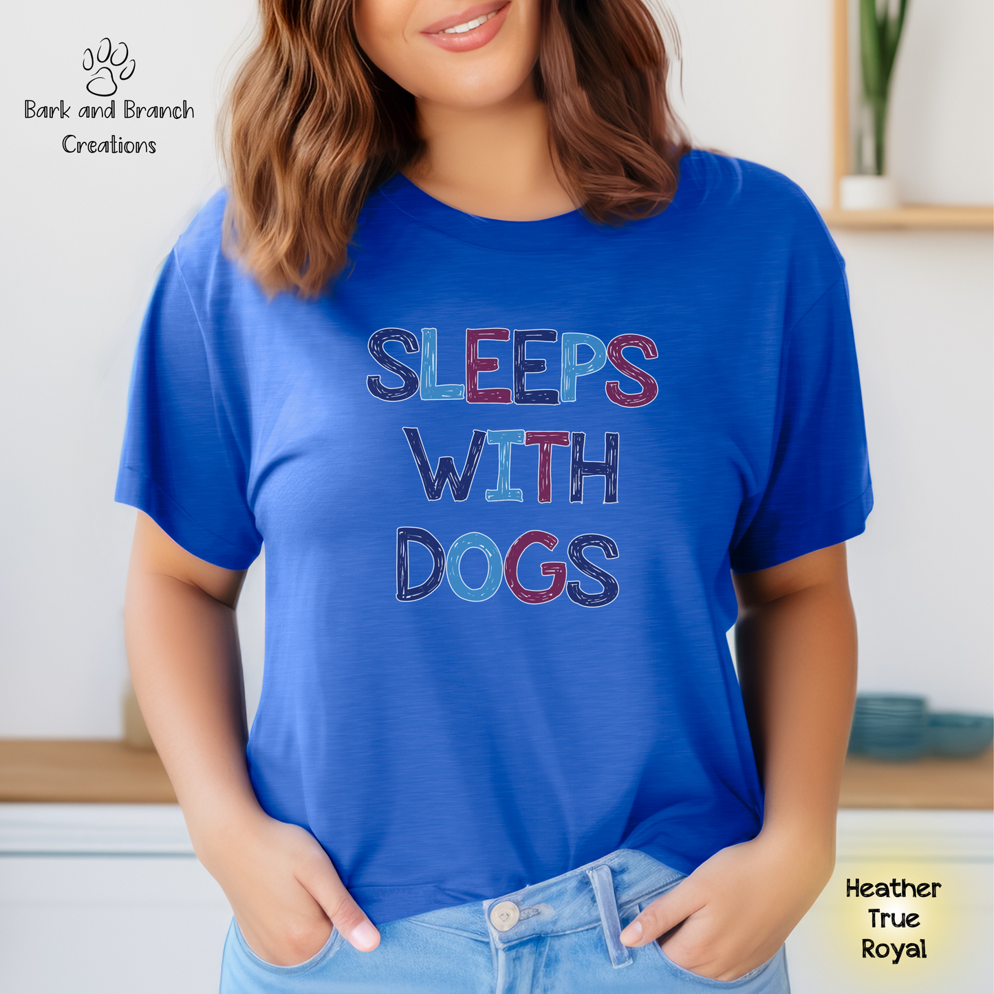 Sleeps With Dogs Soft T-Shirt | Funny Dog Mom Tee | Dog Dad Shirt | Dog Lover Gift | Support Rescue Efforts